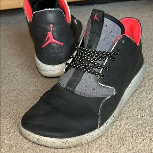 Nike Air Black and Gray Sneakers with Red Accents